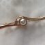 Vintage goldtone, faux pearl and diamante stock pin