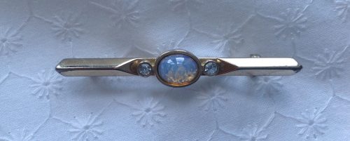 Vintage goldtone faux opal and diamante stock pin