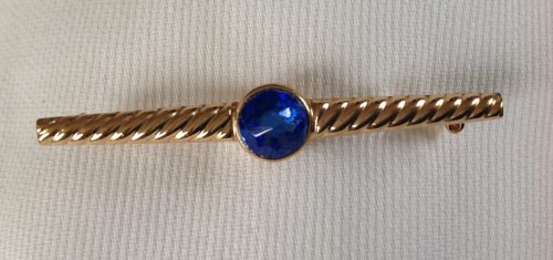 Vintage goldtone and sapphire paste stock pin
