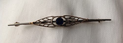 Vintage goldtone with sapphire blue and filigree stock pin