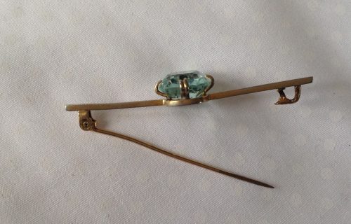 Vintage goldtone and aquamarine paste stock pin