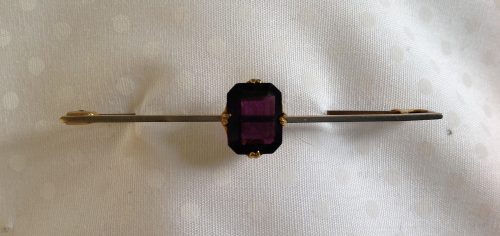 Art Deco goldtone and purple paste stock pin