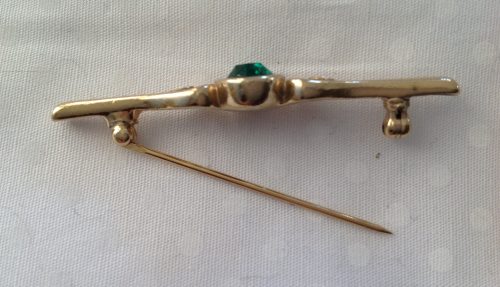 Vintage goldtone with emerald and clear paste stones stock pin