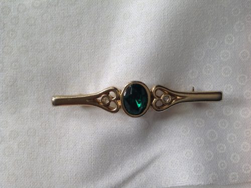 Vintage goldtone with emerald and clear paste stones stock pin