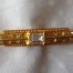 Vintage goldtone and square clear paste stock pin