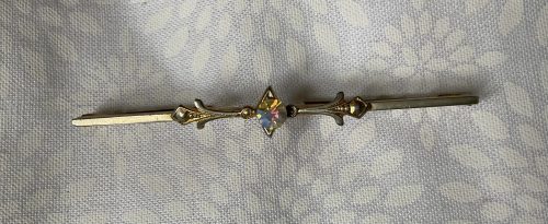 Gold tone and faceted irise stone stock pin